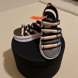 Black, Metallic, Gold and White womens Nike Classic Sandals Size 9